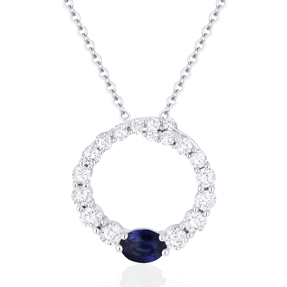 Lady's White 14 Karat Pendant With 18=0.73Tw Round Diamonds And One 0.33Ct Oval Sapphire