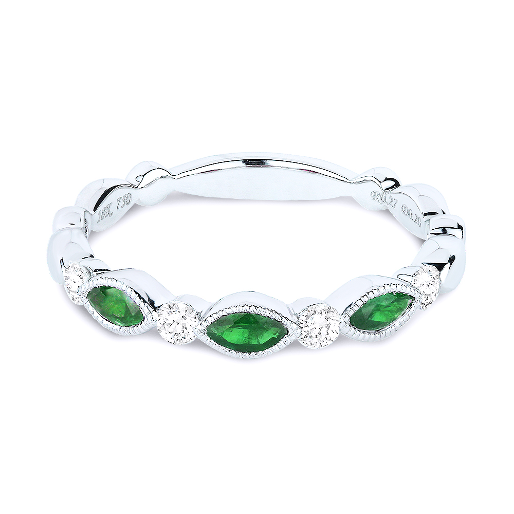 Lady's White 18 Karat Ring With 4=0.21Tw Round Diamonds And 3=0.19Tw Oval Emeralds