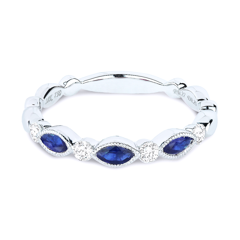 Lady's White 14 Karat Ring With 4=0.21Tw Round Diamonds And 3=0.35Tw Oval Sapphires